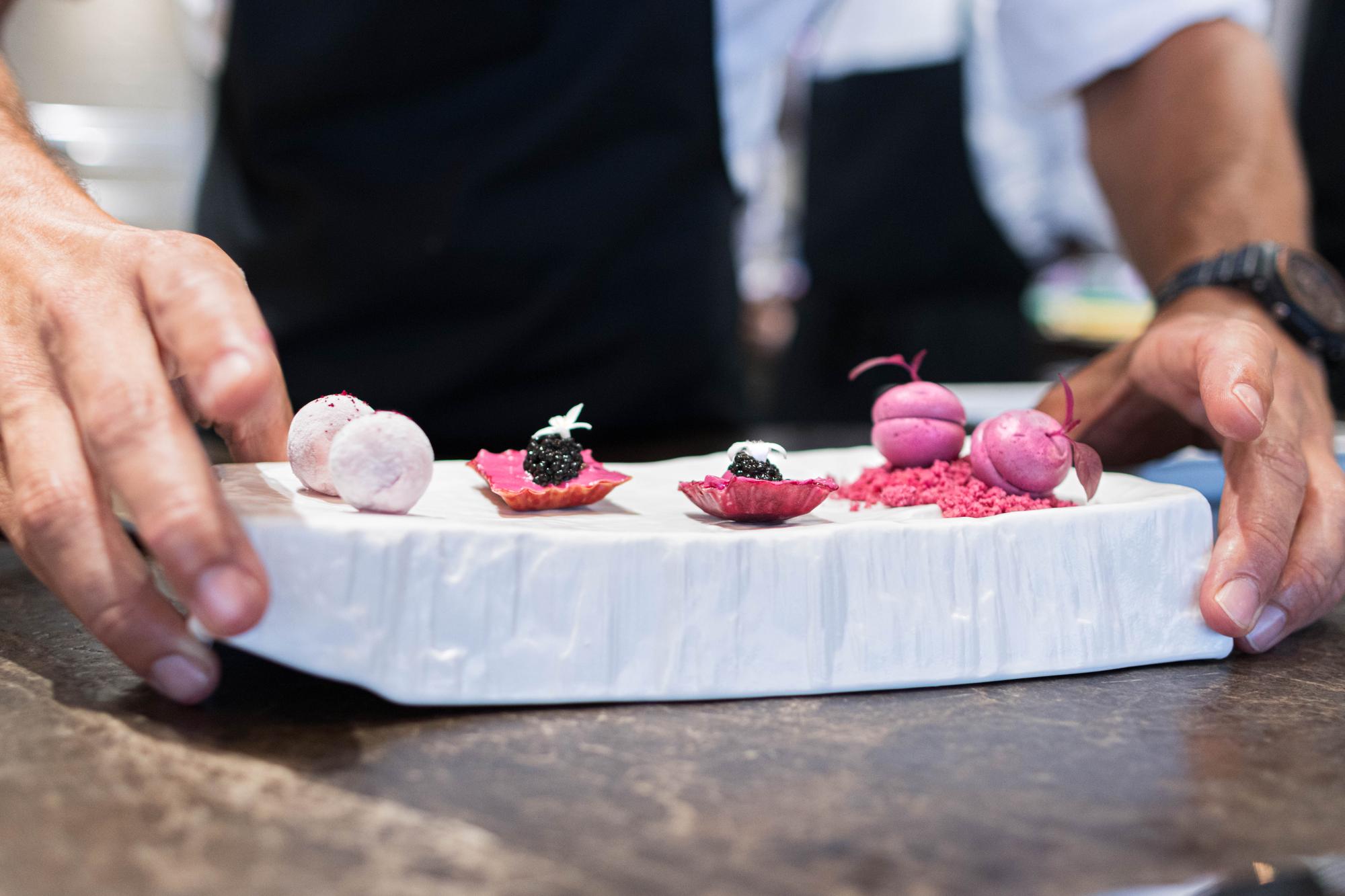 Participant plating a dessert